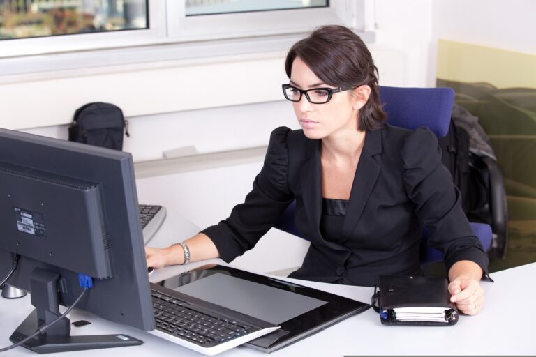 secretary working on computer